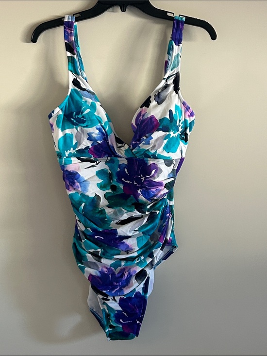 Miraclesuit Other - NWOT. Miracle suit Women’s one piece swimsuit in vibrant floral design.